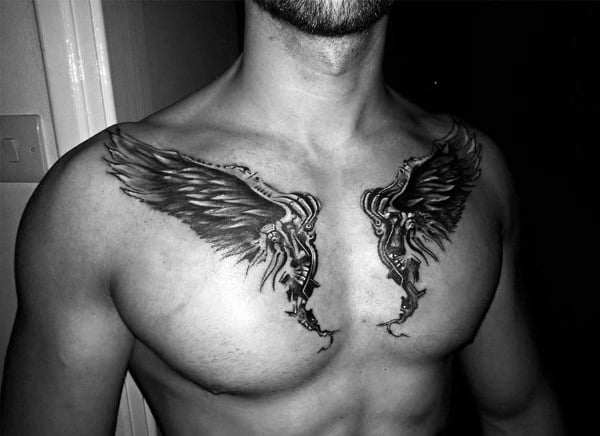 tatuaggio ali sul petto 53